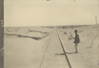 The Trans-Caspian railway line in the dunes of the Karakum Desert, towards Türkmenabat