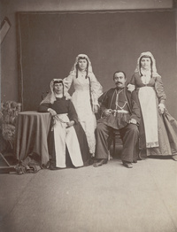 Studio portrait of a Georgian family in traditional costumes