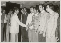 اللاعب حسن علي يسلم على اعضاء فريق المنتخب العسكري الاردني السبعيناتPlayer Hassan Ali greeting the members of the Jordanian military team in the seventies